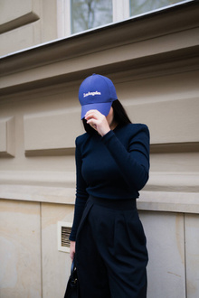 Ribbed knit blouse with long sleeves and shoulder pads