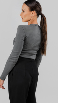 Ribbed knit blouse with long sleeves and shoulder pads