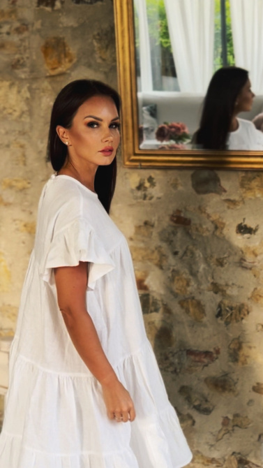 Linen dress with loose fit in white color