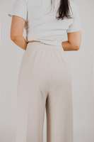 straight cut pants with elastic waistband in beige color
