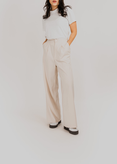 straight cut pants with elastic waistband in beige color