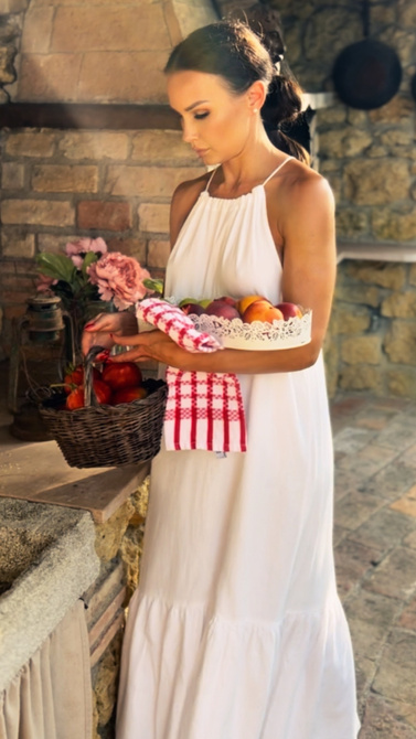 Maxi dress with ruffled neckline tied with string and ruffles